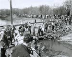 Augustana students pile sandbags